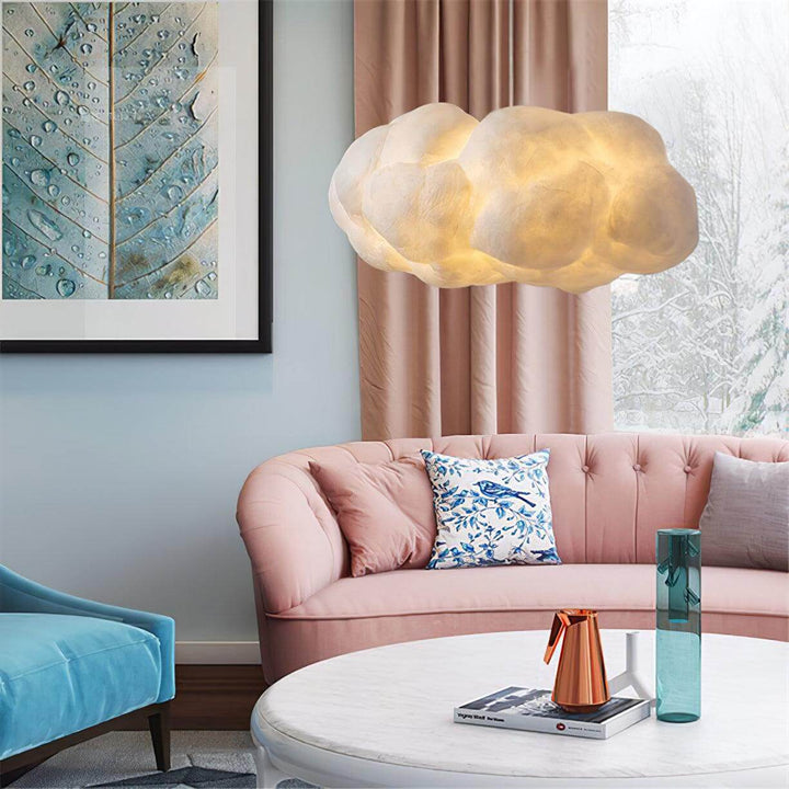 Hvid, skyformet designerlampe. LED pendel til loftet, perfekt til moderne belysning.