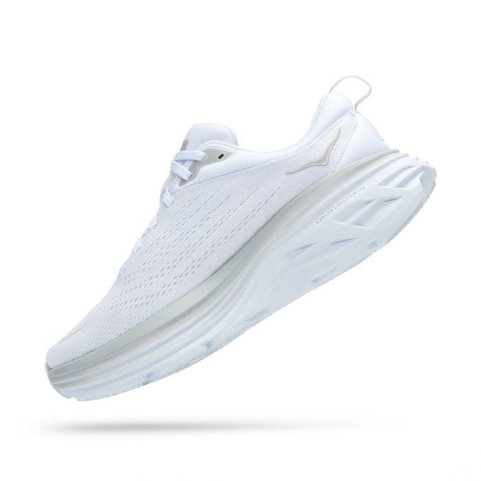 "Hvide sporty sneakers i letvægtsdesign med elegant og moderne udseende, mesh-materiale og reflekterende detaljer."