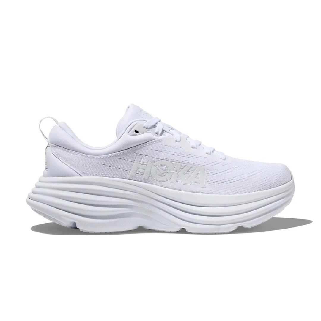 "Hvide sporty sneakers i letvægtsdesign med elegant og moderne udseende, mesh-materiale og reflekterende detaljer."