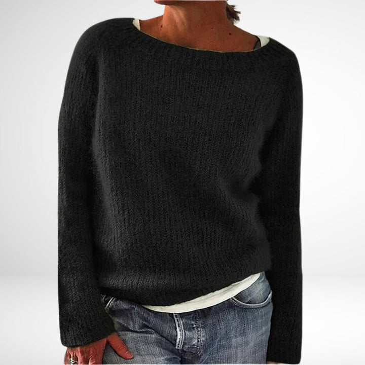 Tidløs dame vinterstrik. Elegant retro sweater til kvinder, en hyggelig langærmet overdel.