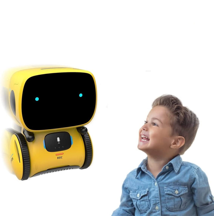 "Interaktiv dansende robot til børn, hvid og blå, synger og reagerer på stemmer, fremmer læring og leg, børnesikker."