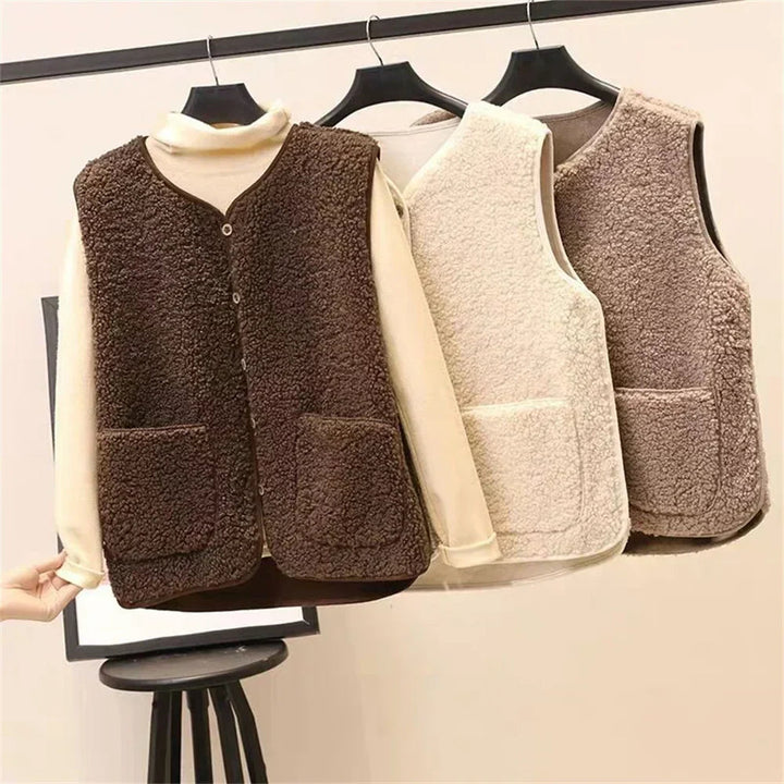 Elegant kvinde vest i khaki. Ideel overgangsjakke til efterår.