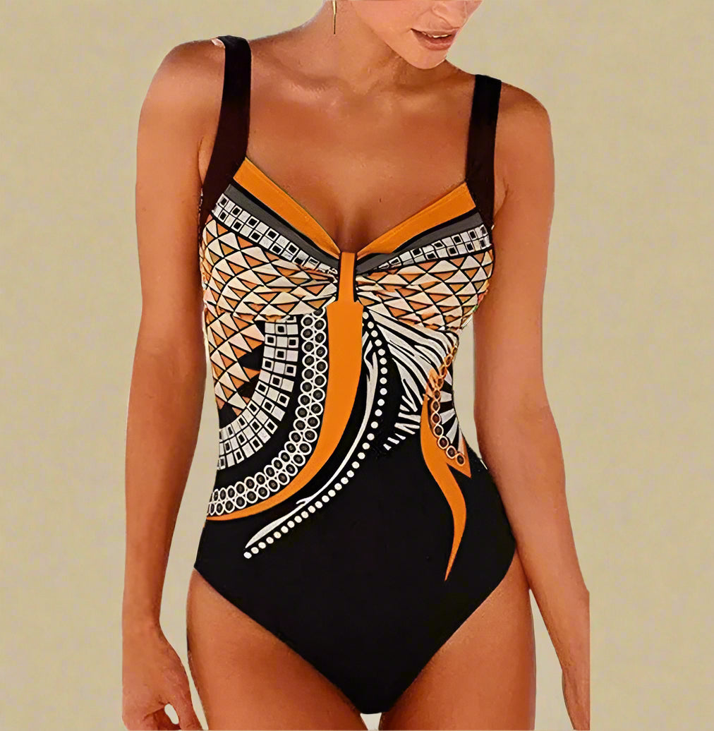 Dame badetøj i klassisk minimalistisk stil. Den elegante badedragt er perfekt til en afslappende dag ved poolen.