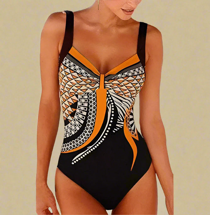 Dame badetøj i klassisk minimalistisk stil. Den elegante badedragt er perfekt til en afslappende dag ved poolen.