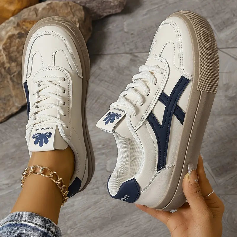 Moderne sporty damesneakers med stødabsorberende sål, ideelle som komfortsko til kvinder.