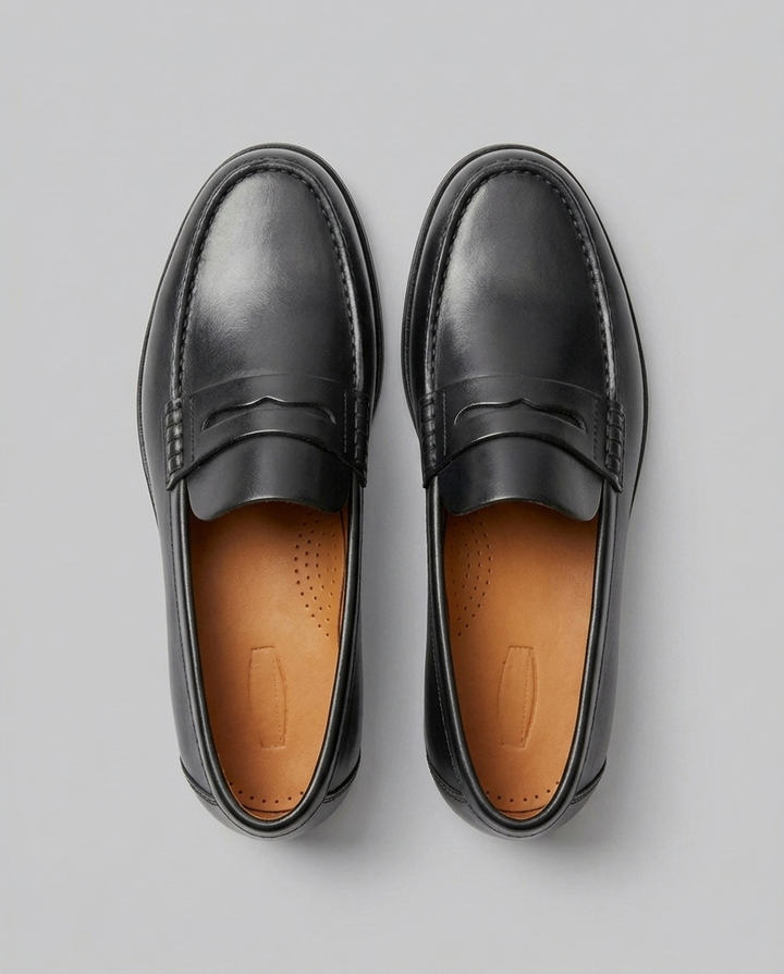 Sorte herre penny loafers. Klassiske og komfortable slip-on sko, der passer til enhver stil.