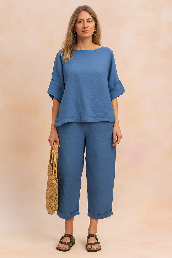 Stilfuldt kvindetøj: Bluse og bukser sæt med løst snit, perfekt som hverdags- eller sommeroutfit.