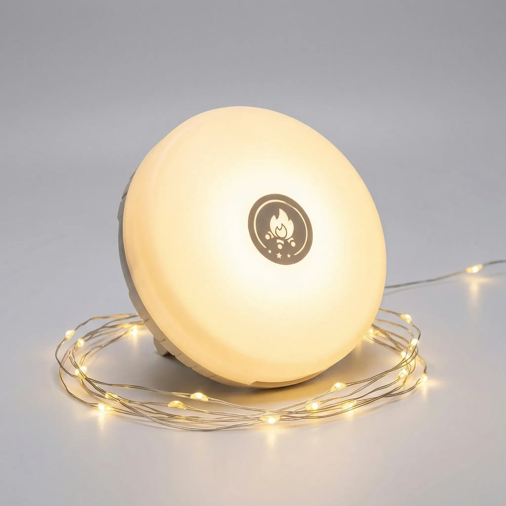 Alsidig 4-i-1 campinglampe med indbygget 10m lyskæde, perfekt til rejser og kompakt opbevaring.