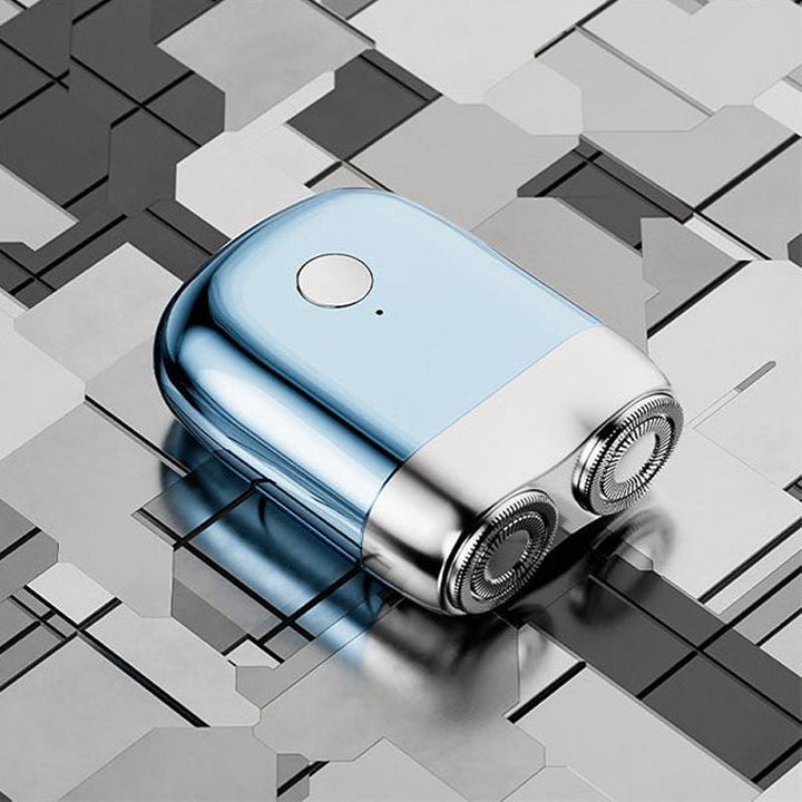 GlideTech batteridrevet elektrisk shaver; USB-opladning. Stille, skånsom, kompakt. Ideel til mænds rejser & grooming.