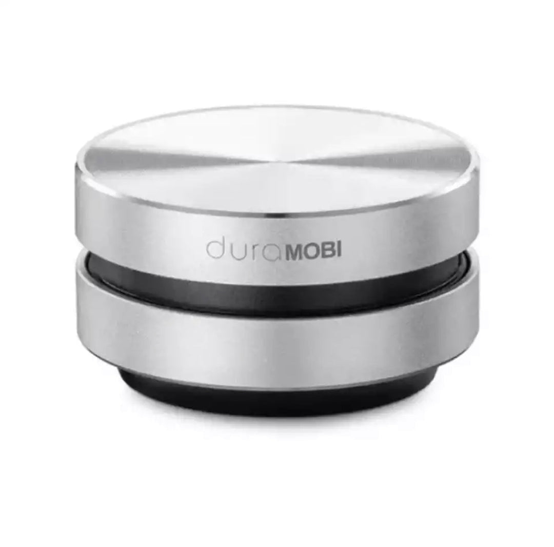 Kompakt sort Bluetooth højttaler, klar til trådløs lydoplevelse på enhver overflade.