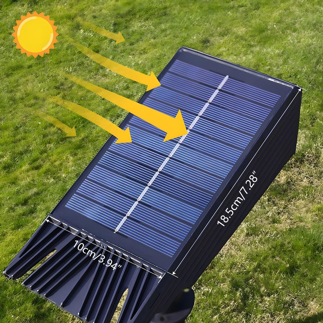 Kraftfuld, vejrbestandig solardrevet LED spotlight med justerbart RGB lys til udendørs haveindretning.