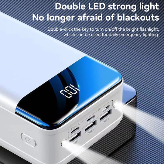 Sort og hvid 50.000 mAh powerbank for lang batteritid, bærbar strøm til alle dine enheder.