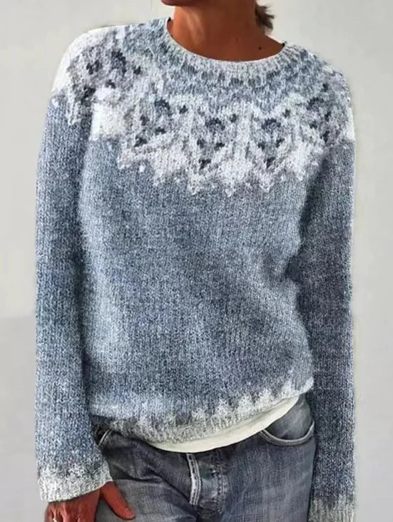 Dame islandsk sweater i afslappet pasform, langærmet. Moderne colorblock design, perfekt vintermode.