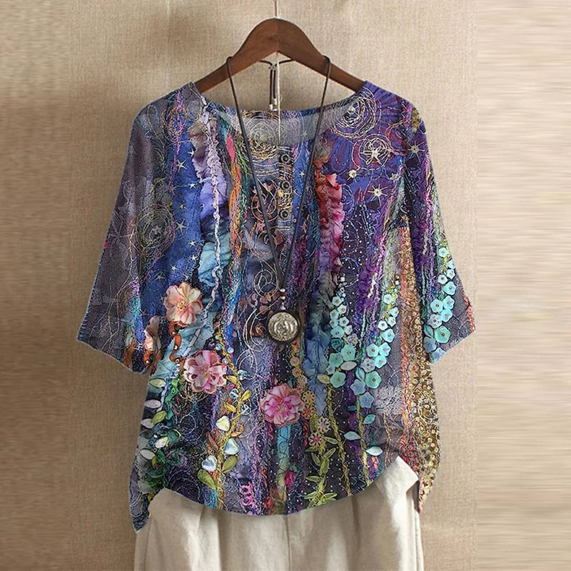 Vintage look retro blomsterbluse. Elegant kvindebluse med afslappet pasform. Damemode.