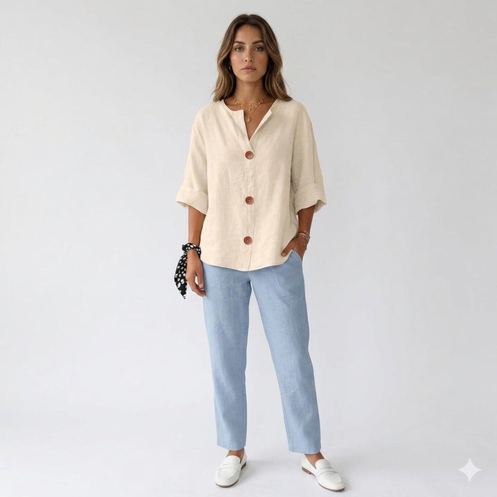 Kvinder løs casual bluse med knapper i front; perfekt til hverdag og komfortabel stil.