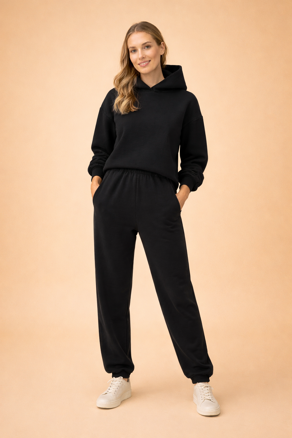 Kvinder oversized hættetrøje og matchende sweatpants joggingsæt til komfortabel hverdagsstil.