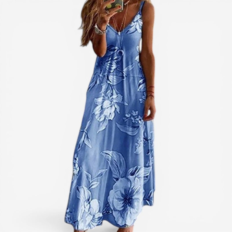 Kvinder ærmeløs V-hals kjole med elegant print. Løs pasform for afslappet sommerkomfort.