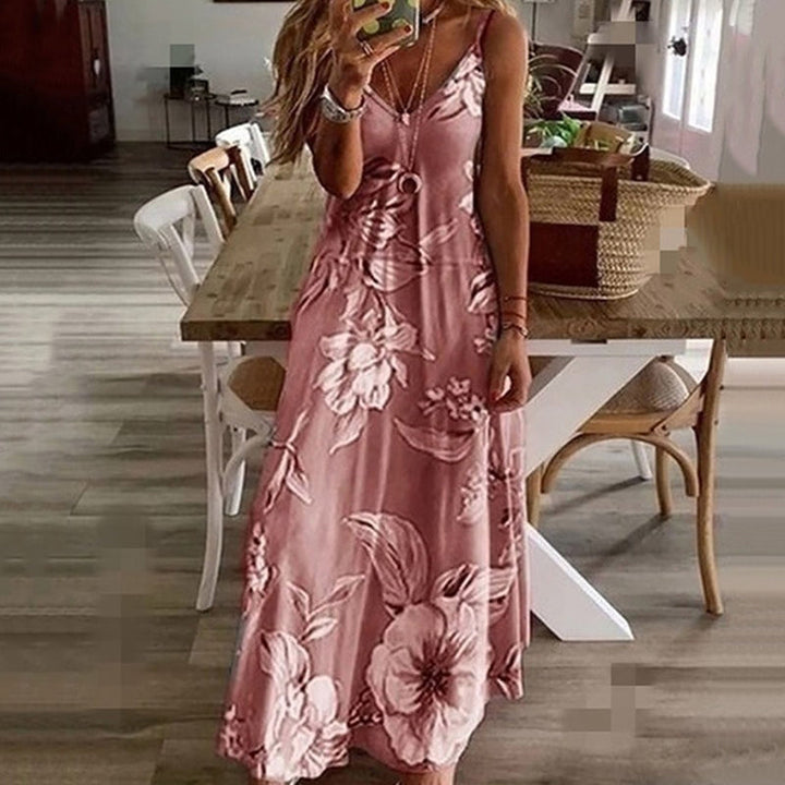 Boheme chic sommerkjole til kvinder. Ærmeløs V-hals design med mønsterprint og løs, luftig pasform.