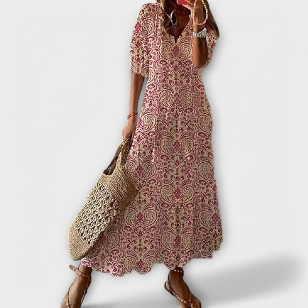 Afslappet maxikjole til kvinder med elegant print, en komfortabel løs pasform; ideel som sommer hverdagskjole.