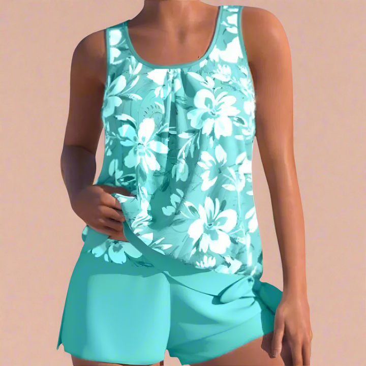 Komfortabelt kvinders blomstrede top- og shorts-sæt. Ideelt til sommeroutfits, ferie og hverdag i løs pasform.