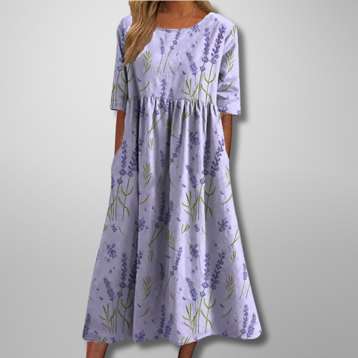 Elegant blomstret midikjole til kvinder, velegnet som sommer- eller festkjole.