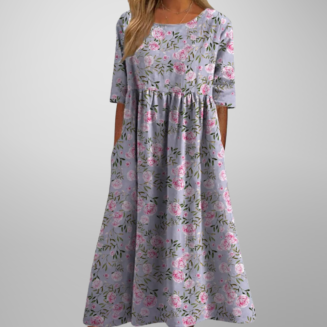 Kvinders elegante blomstrede midikjole med mønster, komfortabel til både hverdag og fest.