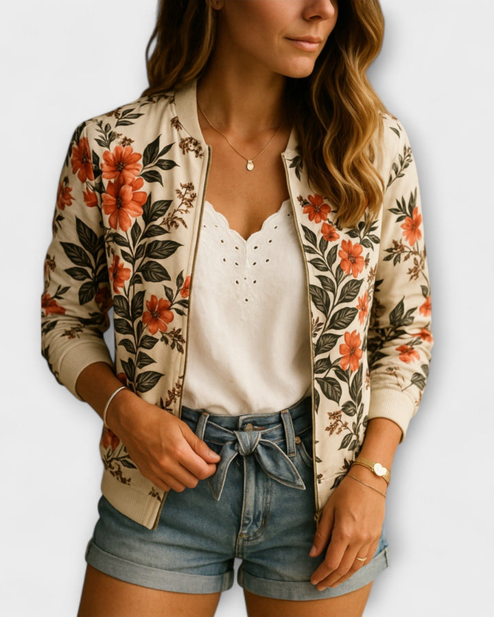 Kvinders bomberjakke i letvægts polyester med blomsterprint. Stilfuld og alsidig forårsjakke.
