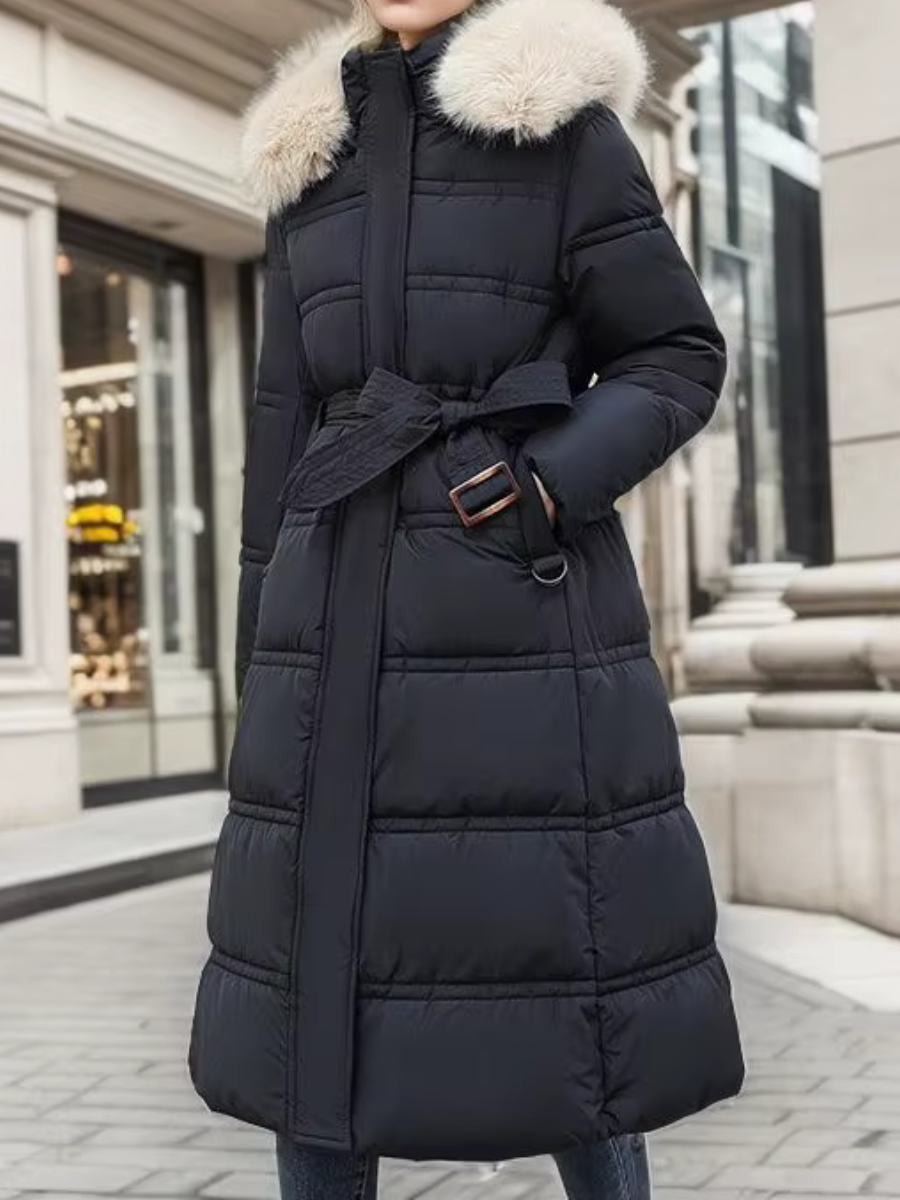 Komfortabel og chic kvinders Maya vinterfrakke, en lang, varm puffer jakke der definerer vintermode.