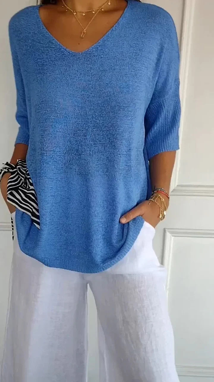 Elegant V-hals strikket top til kvinder, monokromt design for et stilfuldt og casual look.