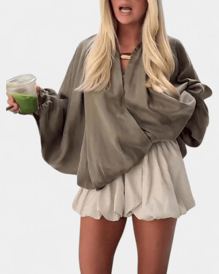 Stilfuld olivengrøn kvindepuffjakke. Blød og varm luksus outerwear, perfekt til modebevidste kvinder.