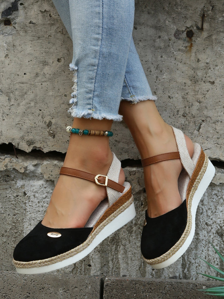 Vævede ortopædiske espadriller til kvinder i sort, med let og åndbart design for maksimal sommerkomfort.