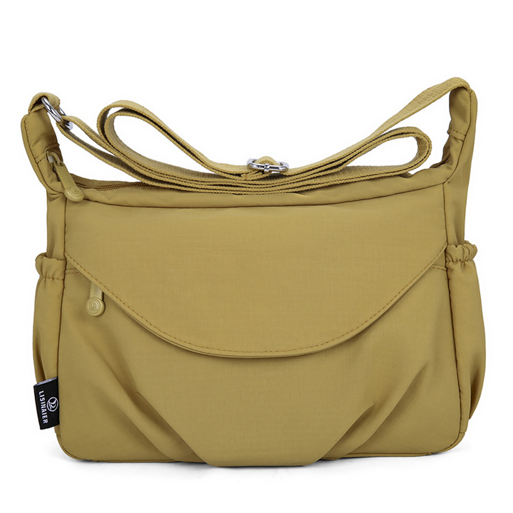 Kvinders elegant vandtæt crossbody taske, perfekt til rejser og pendling.