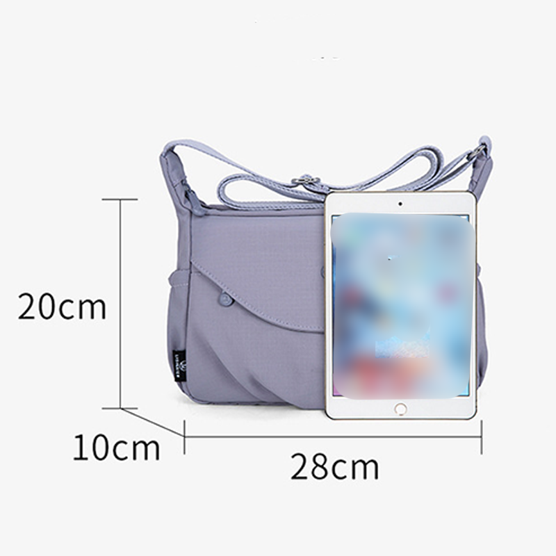 Alsidig crossbody rejsetaske til kvinder, designet for optimal organisation.