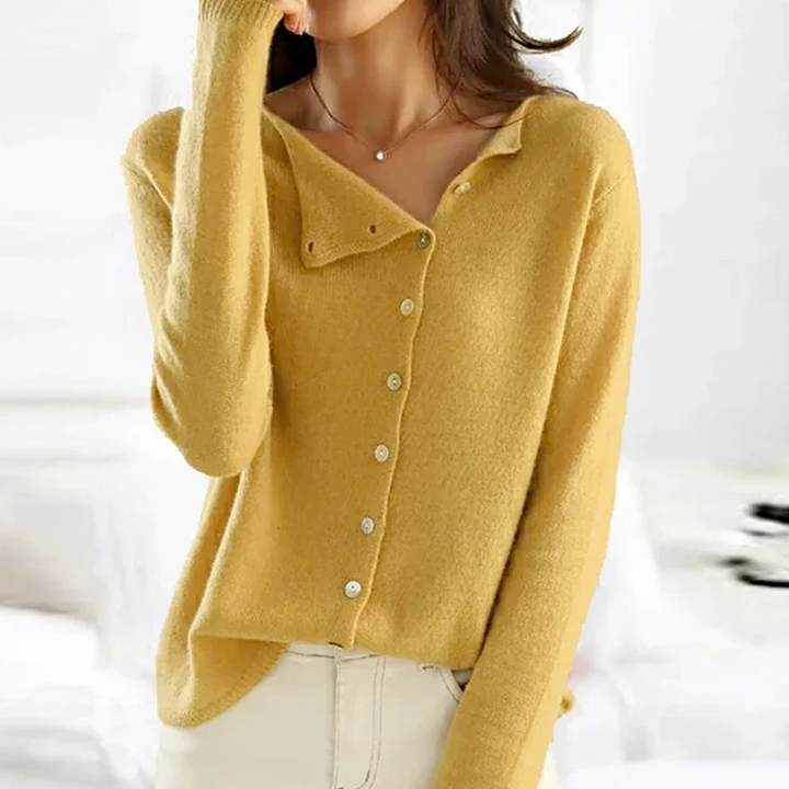 Elegant V-hals cardigan til kvinder med stilfulde knapper. Blød og komfortabel, ideel til et smart casual outfit.