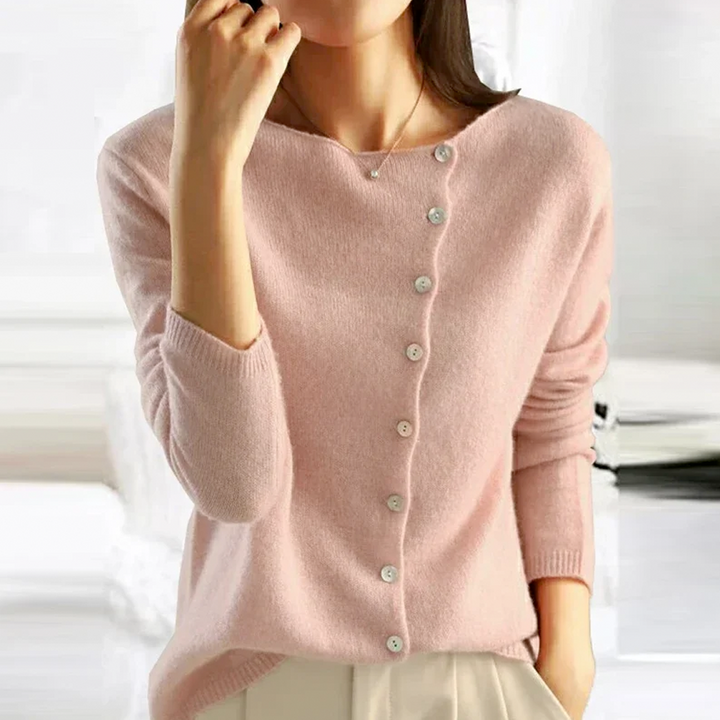 Modebevidst kvinde cardigan med V-hals og knapper. Alsidig til lag-på-lag, tilføjer et tidløst og elegant touch.