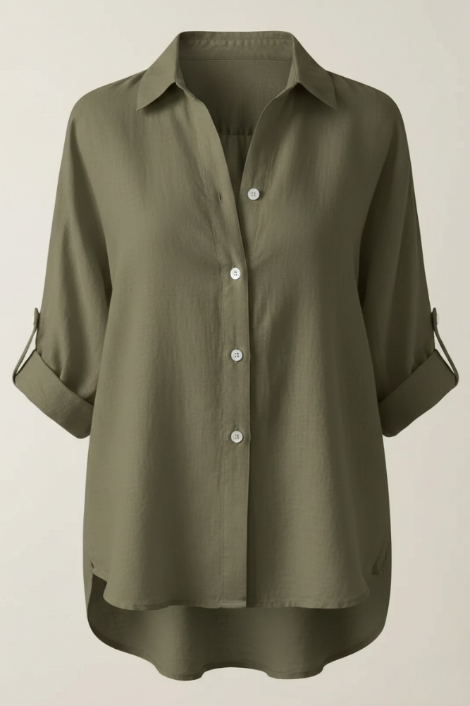 Løs dame skjortebluse med oprullede ærmer for elegant hverdagskomfort.