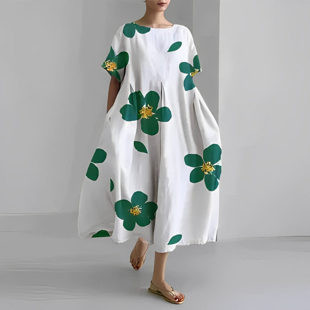 Elegant, afslappet blomstret boho kjole til kvinder. Ideel som hverdagskjole med løs pasform.