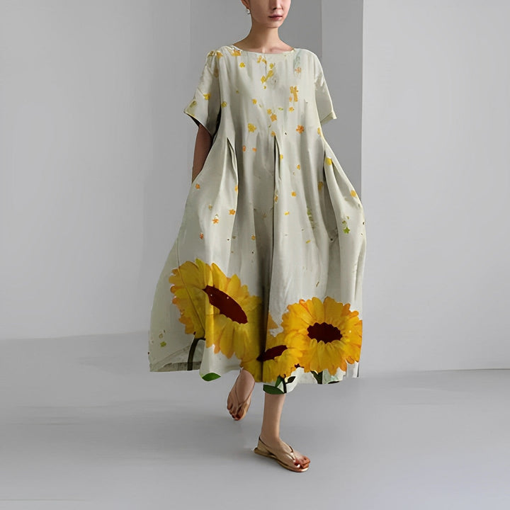 Farverig blomstret forårskjole til damer, ideel til afslappede og elegante lejligheder. Boho stil.