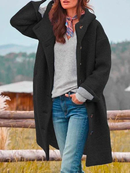 Varm og komfortabel dame hættecardigan. Perfekt til kølige dage og casual kvindemode.