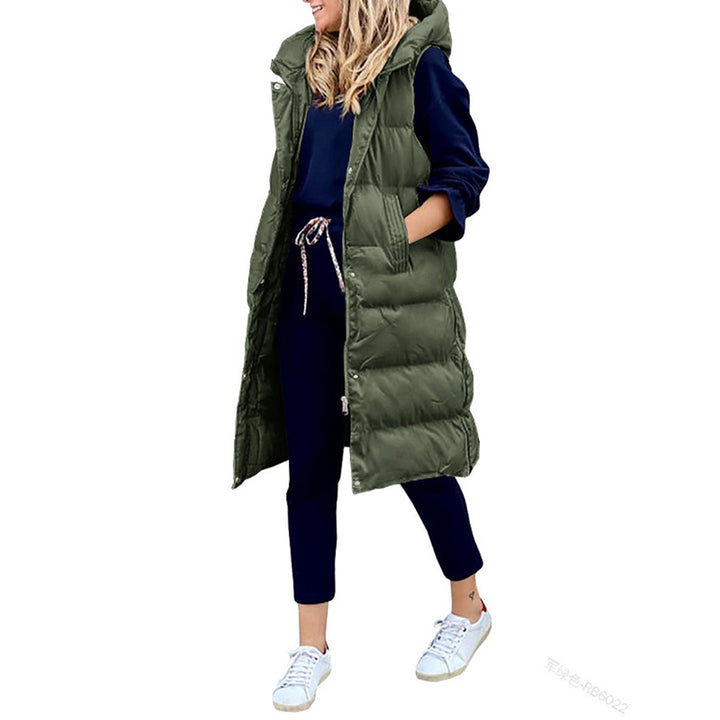 Sort lang dame puffer vest, med praktisk hætte. Alsidig og varm overtøj til efterår og vinter.