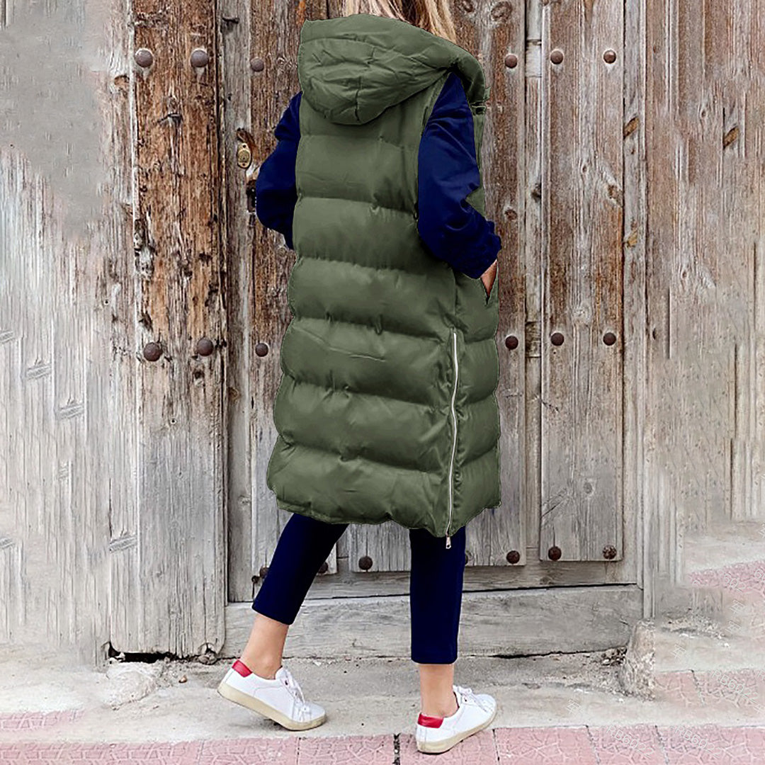 Gul lang dame hættevest i puffer stil. Tilføjer et friskt pust til dit efterårs- eller vinterlook.