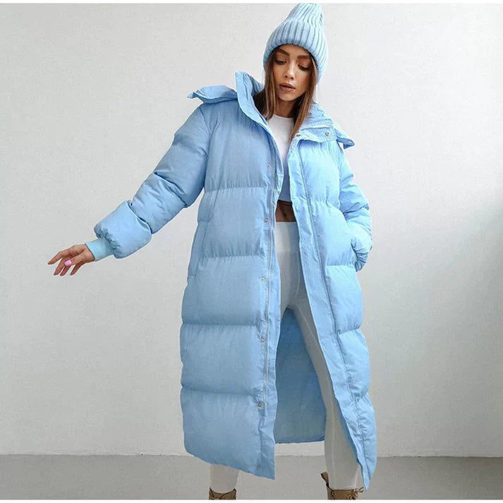 Varm lang vinterjakke til kvinder, sort pufferjakke med hætte. Ideel til udendørs og casual stil.