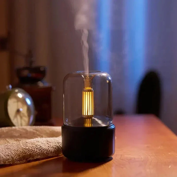 Elektrisk aromaterapi diffuser med flammeeffekt for hygge, afslapning og wellness i hjemmet.