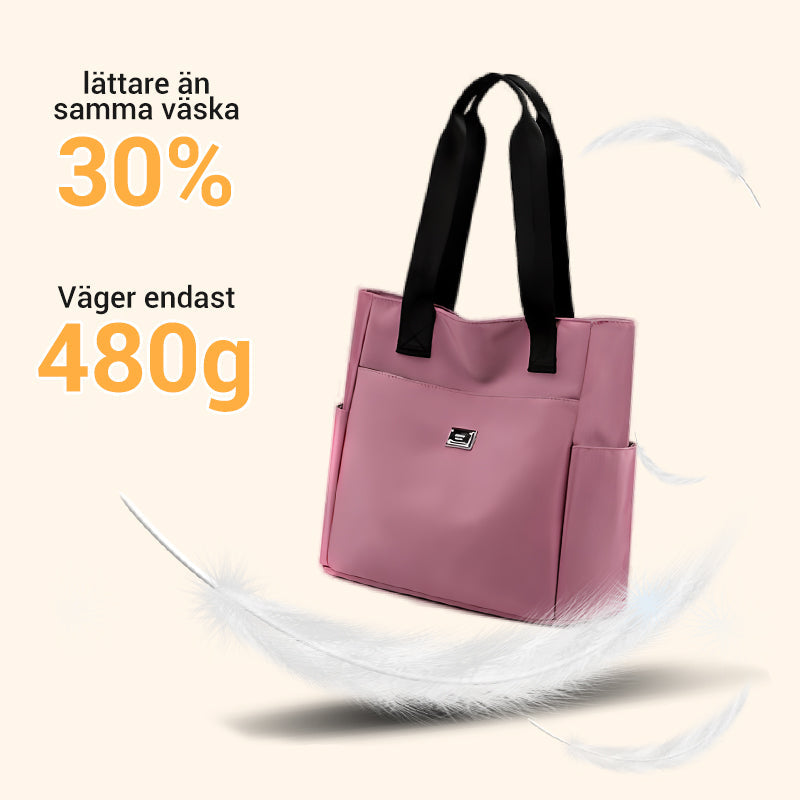 Sort nylon skuldertaske, letvægt og vandtæt. Ideel dametaske til organiseret hverdag.
