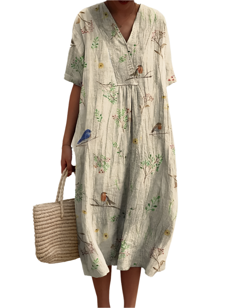Luftig damebluse med rødkælk design, naturprint med grene og fugle, sommerlig elegance til kvinder.
