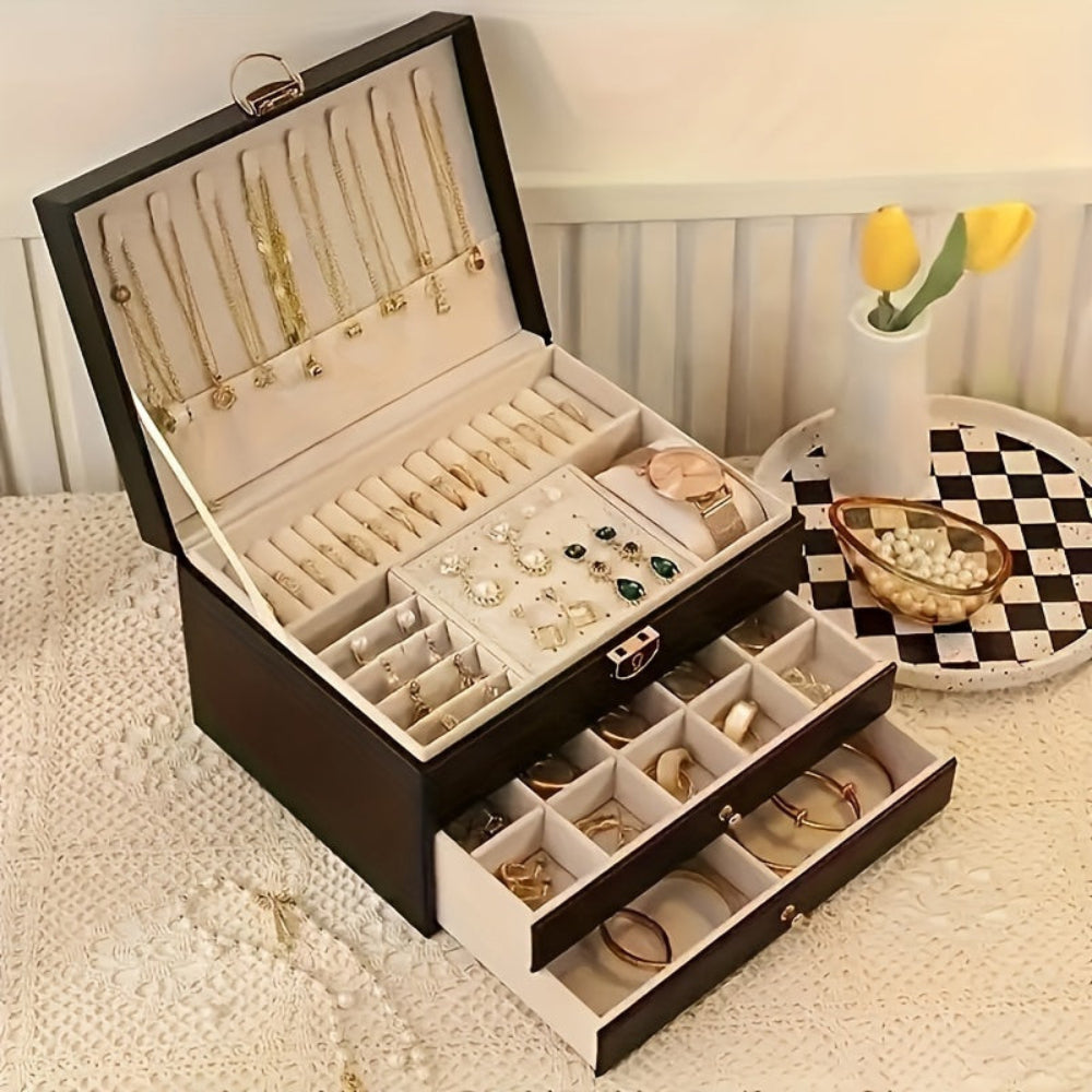 Elegant smykkeorganizer i læder med fløjlsforing & flere rum til dine smykker.