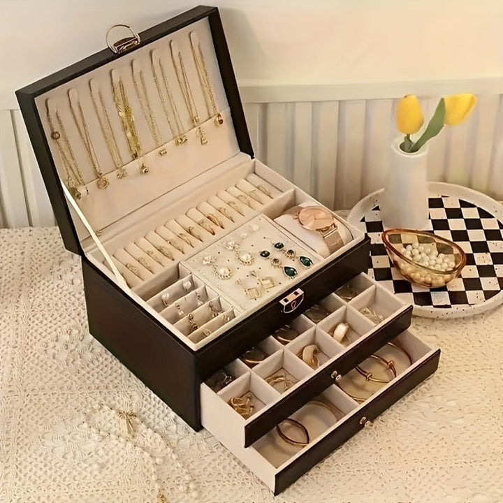 Elegant smykkeorganizer i læder med fløjlsforing & flere rum til dine smykker.