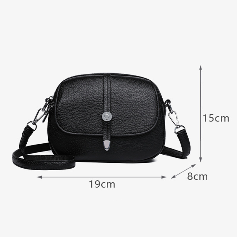 Nærbillede af vandafvisende stof på LumaCarry crossover taske i sort. Holdbar nylon.