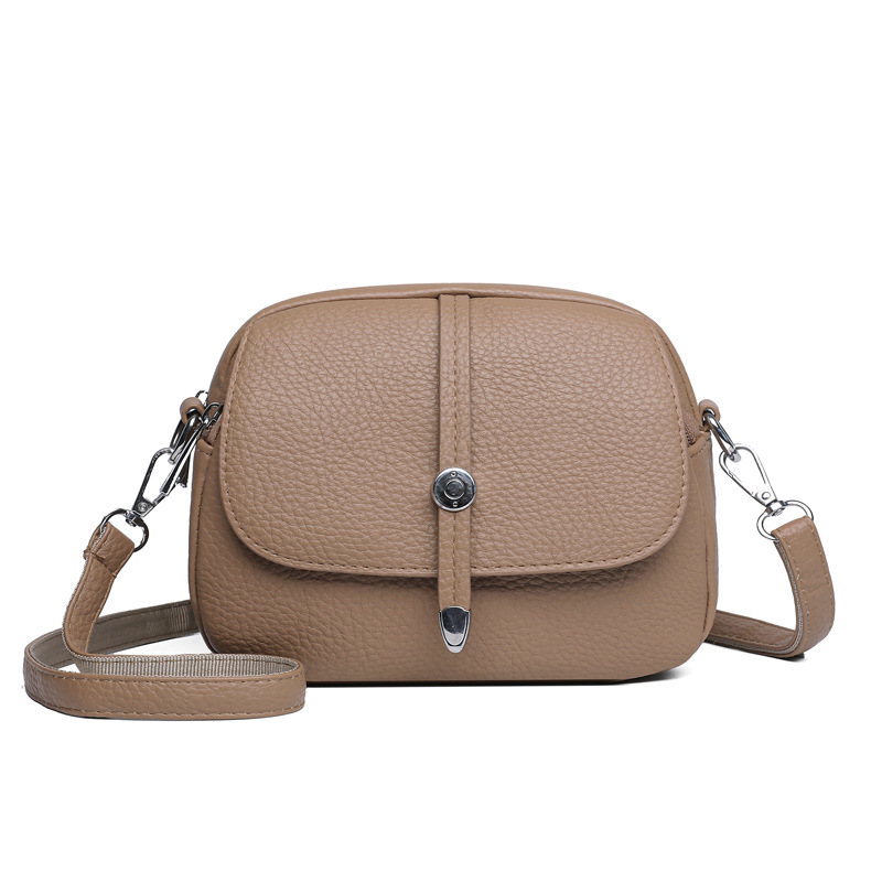 Stilfuld LumaCarry taske i hvid. Vandafvisende nylon crossover, perfekt til bylivet.