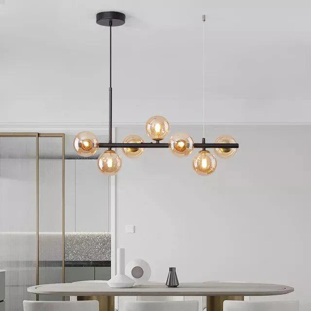 Moderne LumaSphere lysekrone med lang pendel. Stilfuld loftslampe i glas til spisebord og stue.